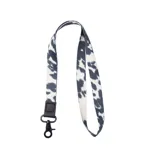 Llavero de tela con diseño en tonos blanco y negro, ideal para llevar en el cuello.