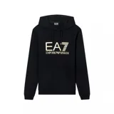 Sudadera con capucha (canguro) de color negro, corte estándar, con bolsillo canguro frontal. Presenta el logo grande de EA7 Emporio Armani en color dorado/beige en el pecho, con el texto 'EMPORIO ARMANI' debajo.
