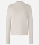 Sweater negro de punto con cuello redondo, puños y ruedo acanalados. Incluye cuello, puños y ruedo de camisa celeste a rayas.