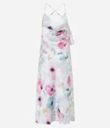 Vestido midi de breteles finos con estampado floral, escote en V y volado en el busto. Confeccionado en tejido satinado con escote degagê en la espalda.