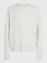 Sweater color crema de lana y acrílico, con cuello redondo y corte regular.