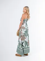 Vestido largo con estampado de hojas, breteles finos regulables y corte imperio.