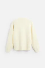 Jersey color crema de corte relajado, tejido con textura. Tiene cuello redondo, mangas largas y terminaciones en rib.