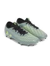 Championes de fútbol Under Armour Magnetico Select 4 FG, color verde con detalles en amarillo y negro. Diseño con cordones y tapones para césped natural.