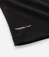 Remera térmica masculina de manga larga y cuello redondo, color negro. Confeccionada en tejido liso de poliéster y elastano.