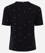 Blusa de pijama de viscosa color negro con lunares blancos y rojos, cuello redondo y mangas cortas.