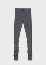 Pantalón gris de calce ajustado con cintura elástica, detalles fruncidos en los tobillos y confeccionado en tejido elástico.