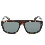 Lentes de sol INVU modelo IB22564B, montura negra con estampado animal print y lentes polarizadas grises.