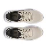 Championes Under Armour Charged Surge 4, color negro con detalles en blanco, ideales para running.