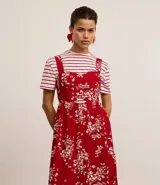 Maxi aros con forma de orquídea esmaltada color rojo.