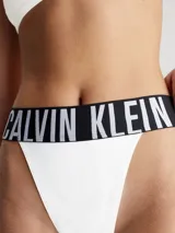 Colaless blanco de tiro alto Calvin Klein, con cintura elástica negra con el logo de la marca en blanco. Confeccionado en microfibra suave y transpirable.