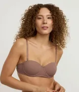 Soutien color marrón topo, con copas moldeadas y textura acanalada. Es un modelo sin breteles con tirantes finos removibles y ajustables.