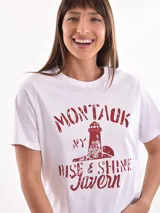 Remera blanca de algodón con estampado de limones y texto en azul.