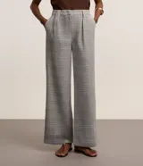 Pantalón de vestir de corte recto, con cintura alta, trabillas, pliegues, bolsillos y estampado de cuadros príncipe de gales.