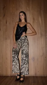 Pantalón palazzo de punto fino con estampado botánico y tiro alto.