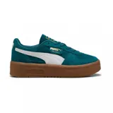 Championes Puma Palermo Elevata, color verde azulado con detalles en blanco y suela marrón.