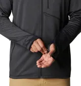 Campera polar Columbia Park View Fleece, color azul jaspeado, con cierre frontal completo, cuello alto, bolsillos laterales con cierre y bolsillo en el pecho con cierre vertical en color verde lima. Cuenta con tecnología Omni-Wick, puños elásticos con orificios para pulgares y protector de barbilla.