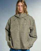 Campera con capucha Obey modelo Vista, con estampado a cuadros en tonos marrón y beige, cierre frontal con cremallera, bolsillos laterales con cremallera y cordón ajustable en el ruedo.