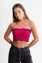 Bombacha colaless marrón con caderín de punto smock color beige con volados amarillos.