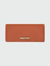 Billetera continental Longchamp Le Roseau color terracota con cierre de broche metálico dorado.
