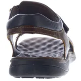 Sandalia de hombre color marrón oscuro, estilo casual, con tiras ajustables mediante velcro y suela de goma oscura. El material exterior parece ser cuero con textura envejecida.