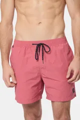 Short de baño azul vibrante, de corte clásico y largo medio, con cintura elástica y cordón ajustable. Cuenta con bolsillos laterales y suspensor de malla fina interior.