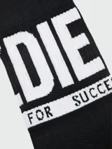 Pack de tres pares de medias Diesel de caña media, color negro con detalles de la marca en blanco. Un par tiene la palabra 'Diesel Successful', otro 'Diesel' y el tercero 'Diesel Living For'.