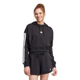 Buzo canguro Adidas Essentials French Terry para mujer, color negro, tipo crop con capucha y cordón ajustable. Confeccionado en French Terry de algodón suave, con corte corto y las icónicas 3 Tiras de Adidas en las mangas.