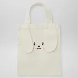 Mini tote bag color beige con estampado de cara de conejo y orejas aplicadas.