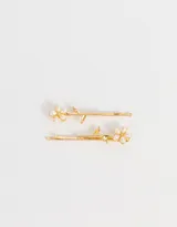 Set de dos horquillas doradas con apliques de perlas sintéticas en forma de flor y hojas.