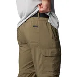 Pantalón largo convertible en short, color caqui, de corte recto y tiro medio. Cuenta con bolsillos laterales con cierre, bolsillos cargo con velcro y cintura parcialmente elástica con cinturón removible.