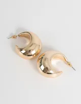 Aros argolla de metal dorado, estilo chunky.