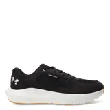 Championes Under Armour Versurge negros con detalles en blanco y suela blanca con base color caramelo.