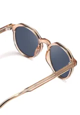 Gafas de sol redondas color champagne con lentes grises.
