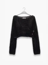 Sweater corto tejido con tres hilos de distintos tonos, uno de ellos con lurex.