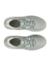 Championes Under Armour Charged Pursuit 4 para mujer, color verde claro con logo plateado.