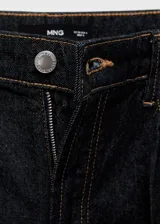 Jeans de tiro alto color gris oscuro, con cierre de botón y cremallera, trabillas, diseño wide leg y cinco bolsillos.