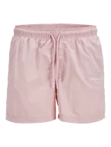 Short de baño rosado con cintura elástica y cordón ajustable.