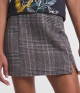 Minifalda de polivelour con estampado de cuadros en tonos grises y marrones.