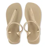 Sandalias Havaianas modelo Flash Urban, color dorado, con tira trasera y diseño trenzado en las tiras superiores.