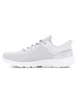 Championes Under Armour Charged Escape 4, color gris claro con logo en gris oscuro.