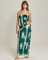 Camisola con estampado de números en verde y blanco, escote en V y tirantes finos.