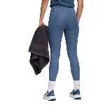 Calza deportiva Puma Essential Tight HW 7/8 color azul con logo negro en la pierna izquierda y bolsillos laterales.