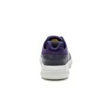 Zapatillas Caterpillar Hex Lite Leather color azul marino con detalles en violeta y suela blanca. Capellada de cuero flor, forro interno de materiales reciclados, plantilla de espuma PU, suela de EVA liviana.