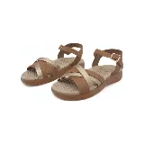 Sandalias bajas color beige con tiras cruzadas en beige y plateado, y tira al tobillo con hebilla dorada.