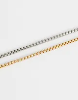 Set de dos pulseras flexibles con cadena de eslabones cuadrados, una plateada y otra dorada.