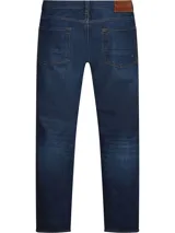 Jeans rectos de denim en color azul, confeccionados con algodón elástico y parches distintivos de Tommy Hilfiger.