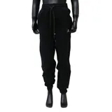 Pantalón de mujer de felpa color negro, con cintura elástica y ajuste de cordón.