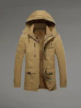 Campera de algodón verde oscura con capucha, múltiples bolsillos y diseño práctico.