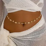 Caderin dorado con dije de estrellas de mar y caracoles.